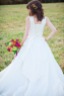 Urban Petals, outdoor bridal portrait, floral hairpiece, orange, green purple, fall wedding, outdoor wedding, horse farm
